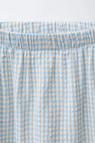 Брюки из рельефной ткани в клетку- Заказать в России