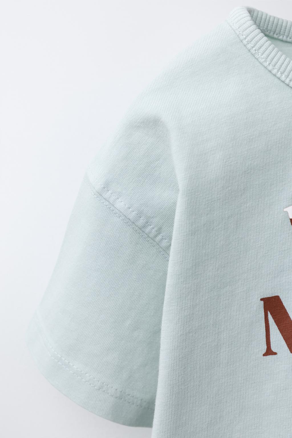 ФУТБОЛКА С ЭФФЕКТОМ ПОТЕРТОСТИ И НАДПИСЬЮ