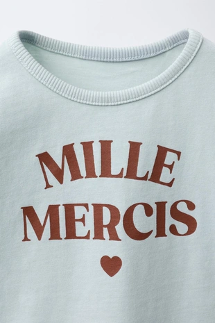 Футболка с эффектом потертости и надписью