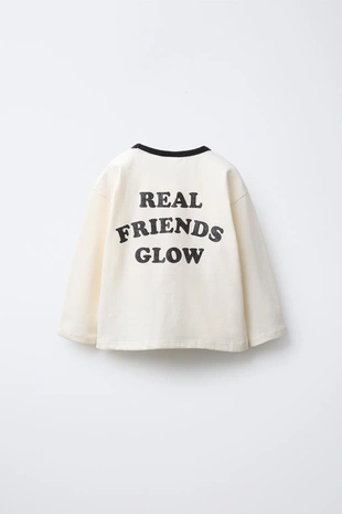 Лонгслив с блестящим принтом- Заказать в России