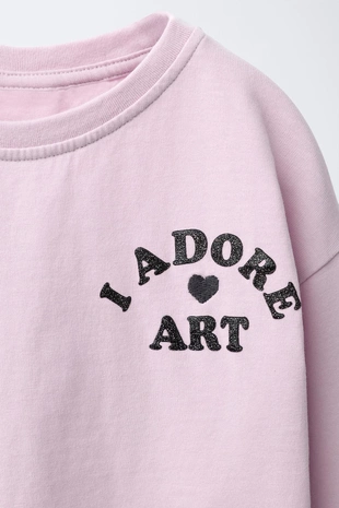 Лонгслив с блестящим принтом