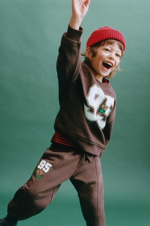 Брюки-джоггеры с вышивкой «цифра и животное»- Заказать в России