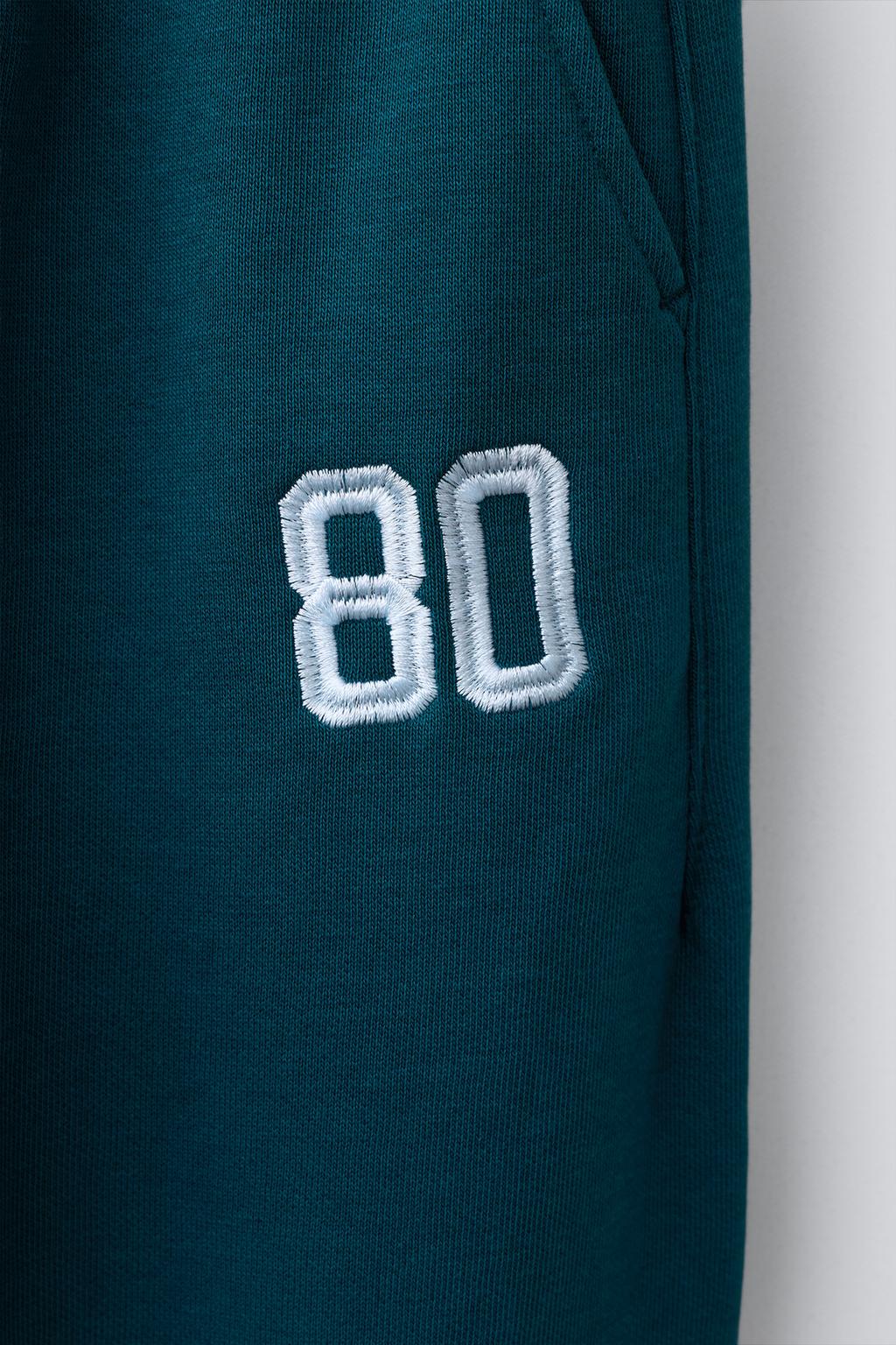 ДЖОГГЕРЫ ИЗ МЯГКОЙ ТКАНИ С НОМЕРОМ