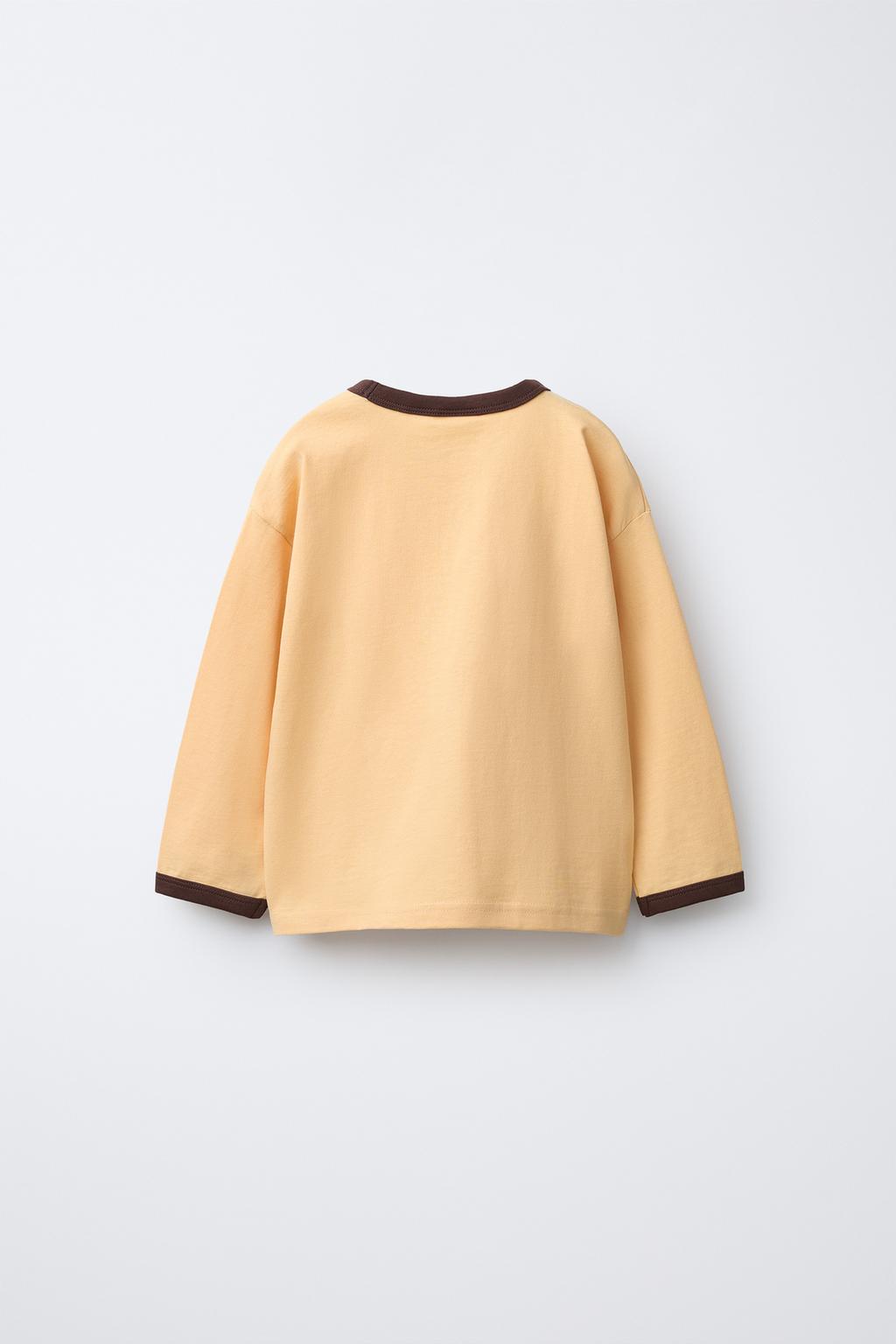 ОДНОТОННАЯ ФУТБОЛКА С КОНТРАСТНЫМИ КАНТАМИ НА ВОРОТНИКЕ