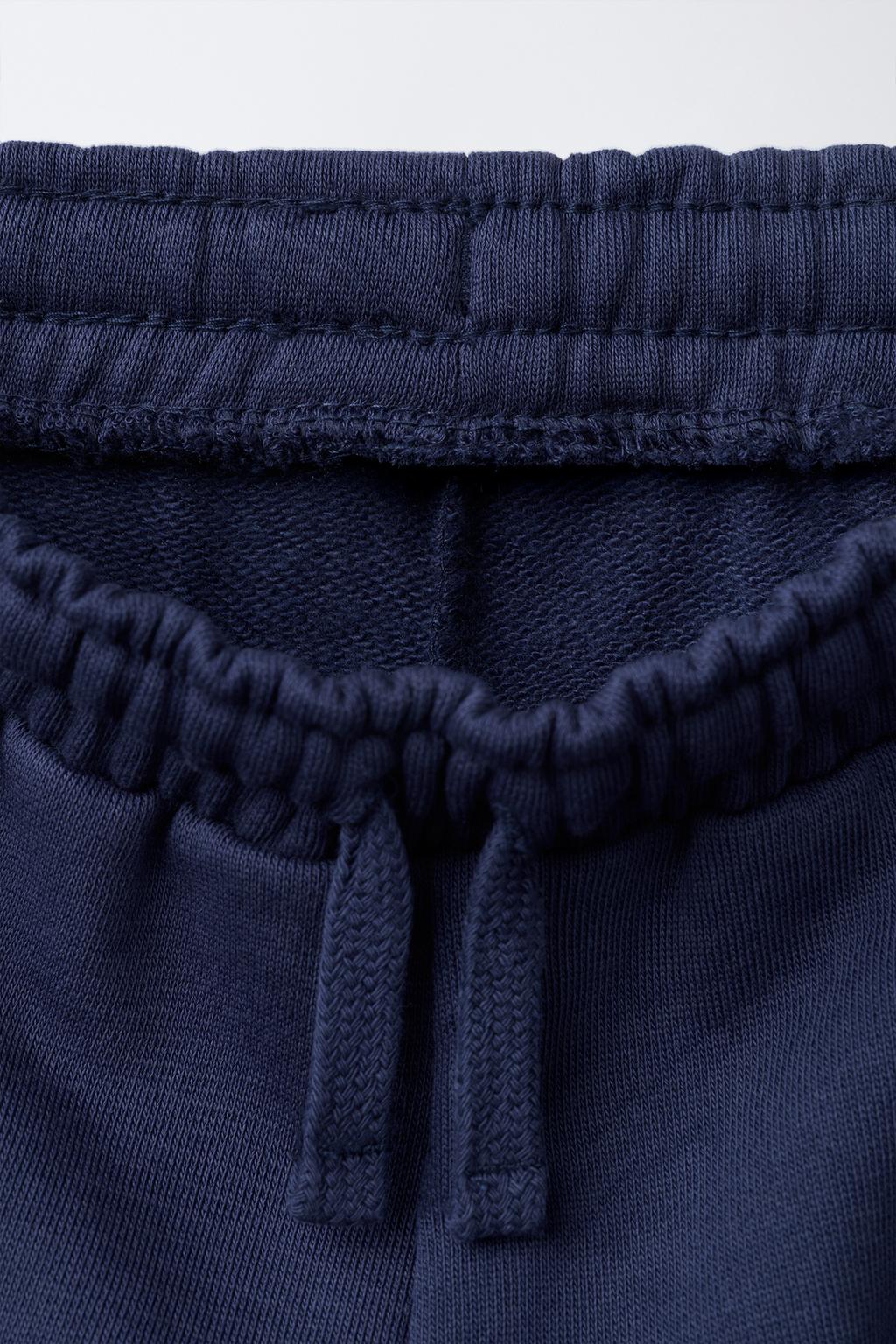 БРЮКИ-ДЖОГГЕРЫ С ВЫШИВКОЙ «ЛЕВ»