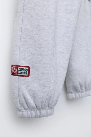 Брюки-джоггеры с вышивкой в виде животных- Заказать в России