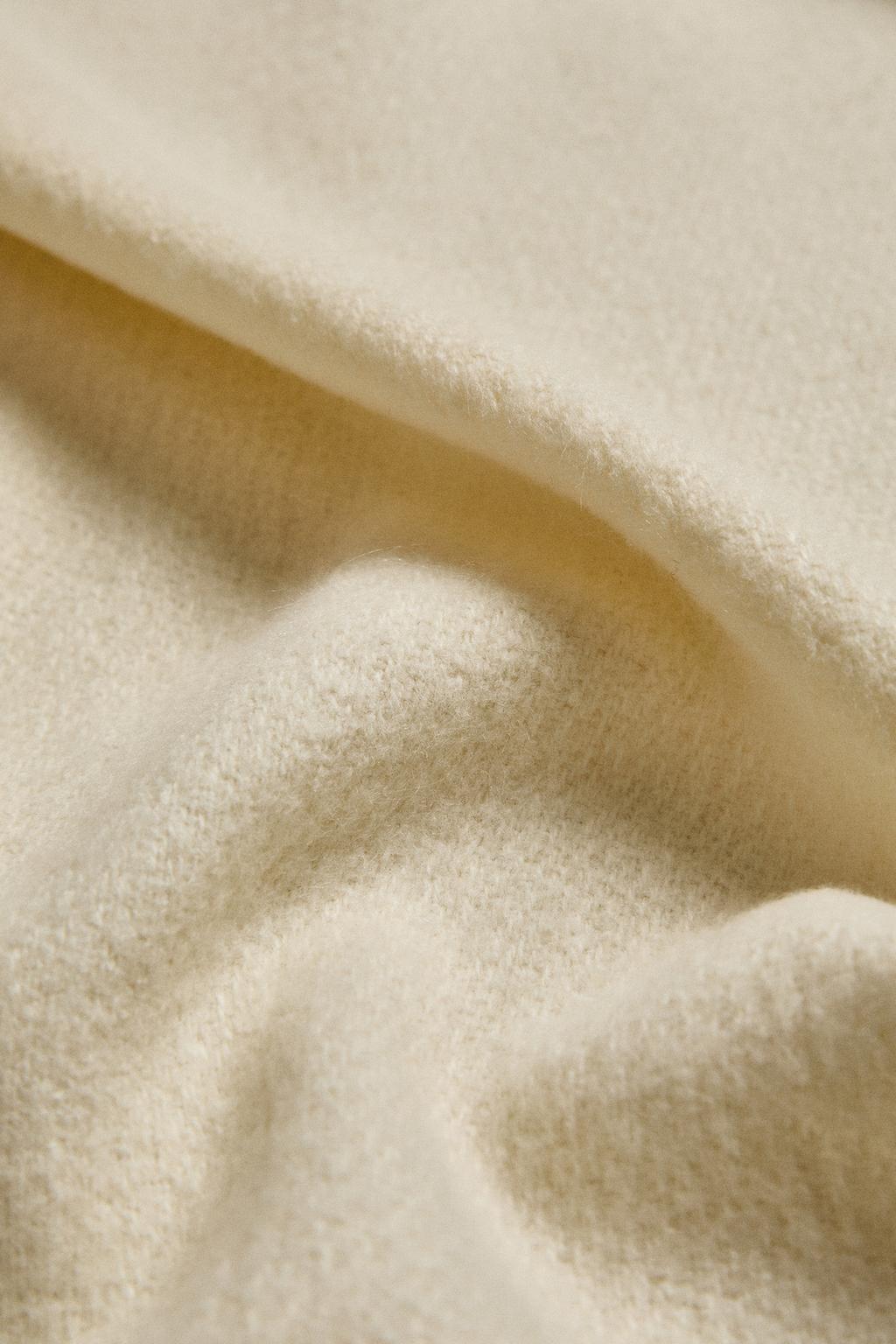 Декоративный плед с бахромой