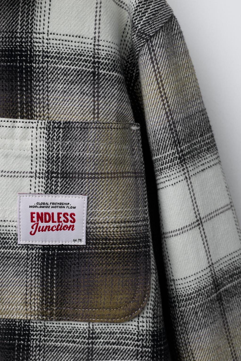 КУРТКА-РУБАШКА В КЛЕТКУ С ОТСТЕГИВАЮЩИМСЯ КАПЮШОНОМ ИЗ МЯГКОЙ ТКАНИ