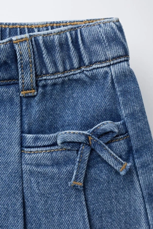 Джинсовая юбка в складку с бантами- Заказать в России