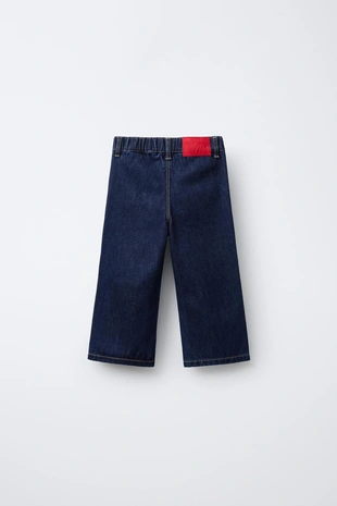 Джинсы-кюлоты с волнистыми карманами- Заказать в России