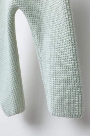 Трикотажные брюки с жемчужным узором- Заказать в России