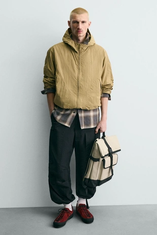 Прорезиненный рюкзак с клапаном- Заказать в России