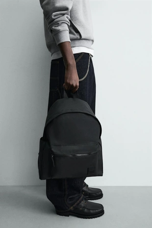 Прорезиненный рюкзак- Заказать в России