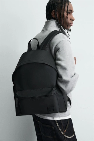 Прорезиненный рюкзак- Заказать в России