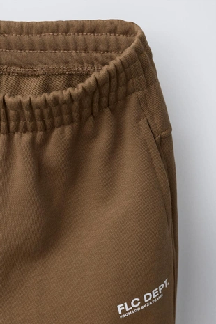 Джоггеры из мягкой ткани с надписью- Заказать в России