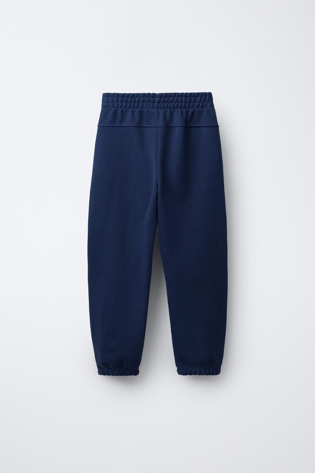 ДЖОГГЕРЫ ИЗ МЯГКОЙ ТКАНИ С НАДПИСЬЮ