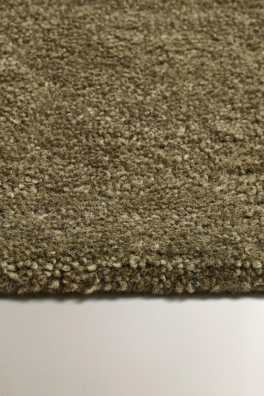 Шерстяной ковер