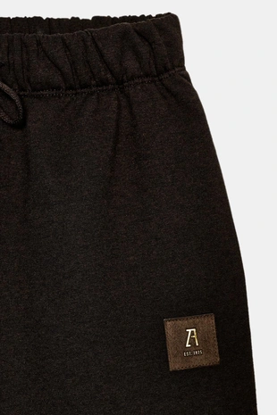 Брюки из мягкой ткани с нашивкой- Заказать в России