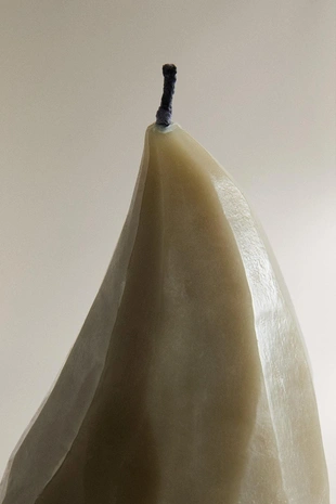 Декоративная зеленая свеча в форме капли- Заказать в России