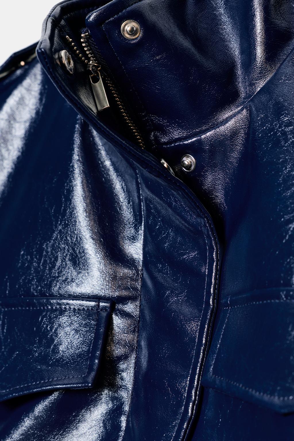 ЖИЛЕТ ИЗ ИСКУССТВЕННОЙ КОЖИ С ХЛЯСТИКАМИ