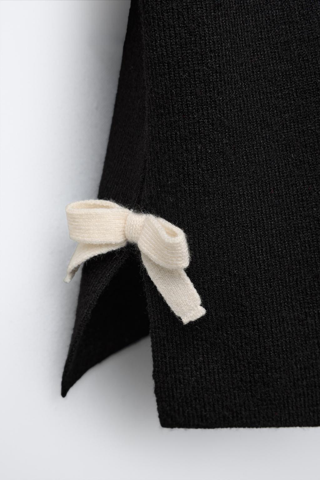 ВЯЗАНЫЙ ДЖЕРСИ С ВОЛНИСТЫМИ ДЕТАЛЯМИ