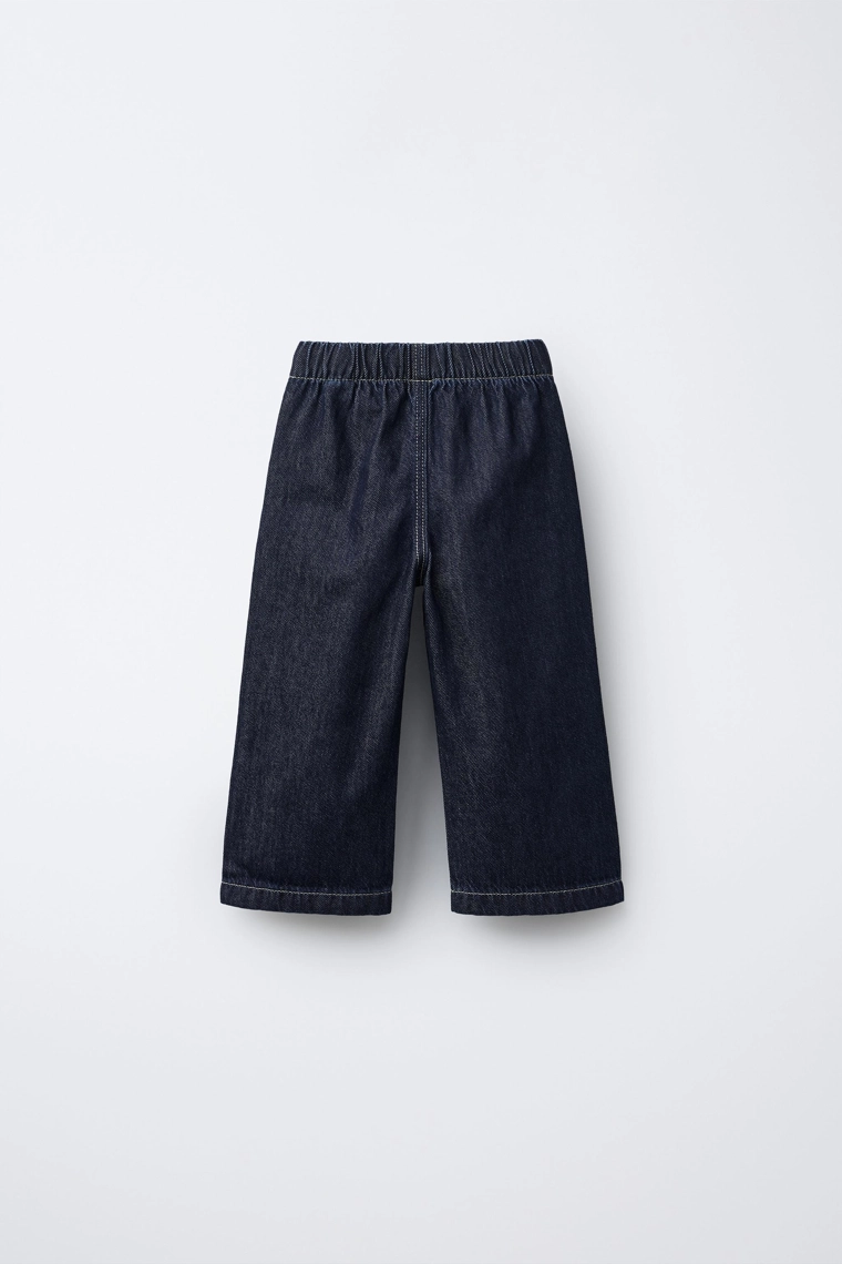 Джинсы свободного кроя