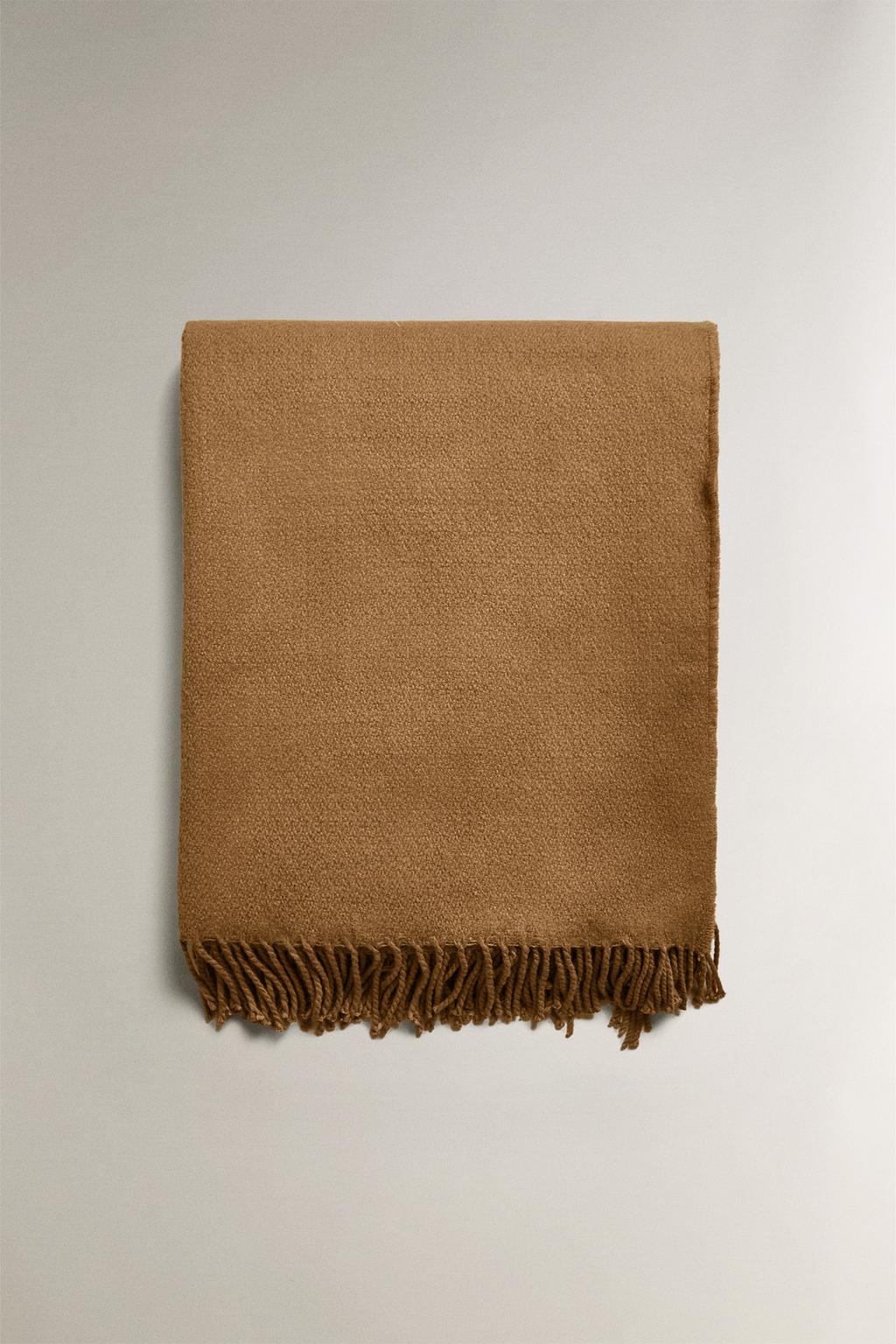 Декоративное покрывало с бахромой