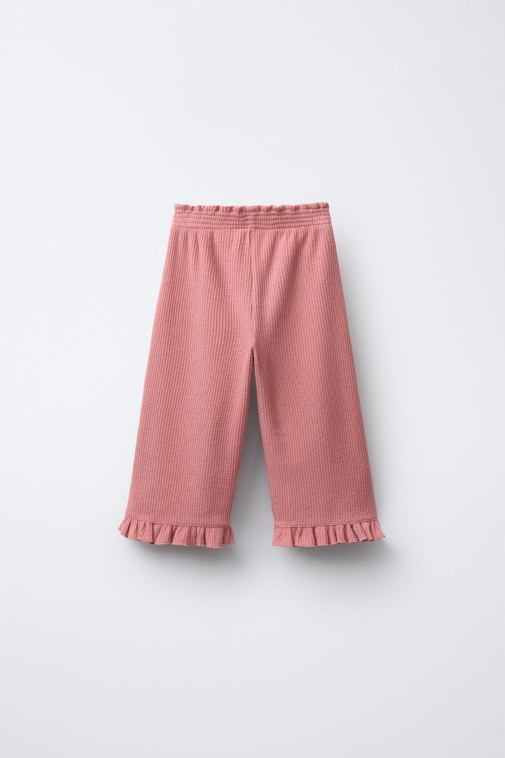 БРЮКИ-КЮЛОТЫ ИЗ РИФЛЕНОГО ТРИКОТАЖА С ВОЛАНАМИ