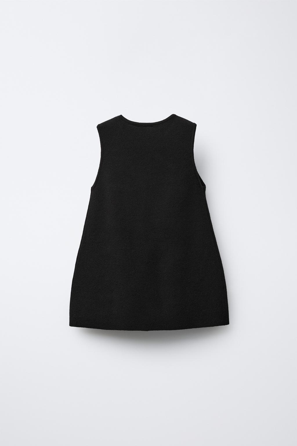 ТРИКОТАЖНОЕ ПЛАТЬЕ С БАНТАМИ В КЛЕТКУ ВИШИ