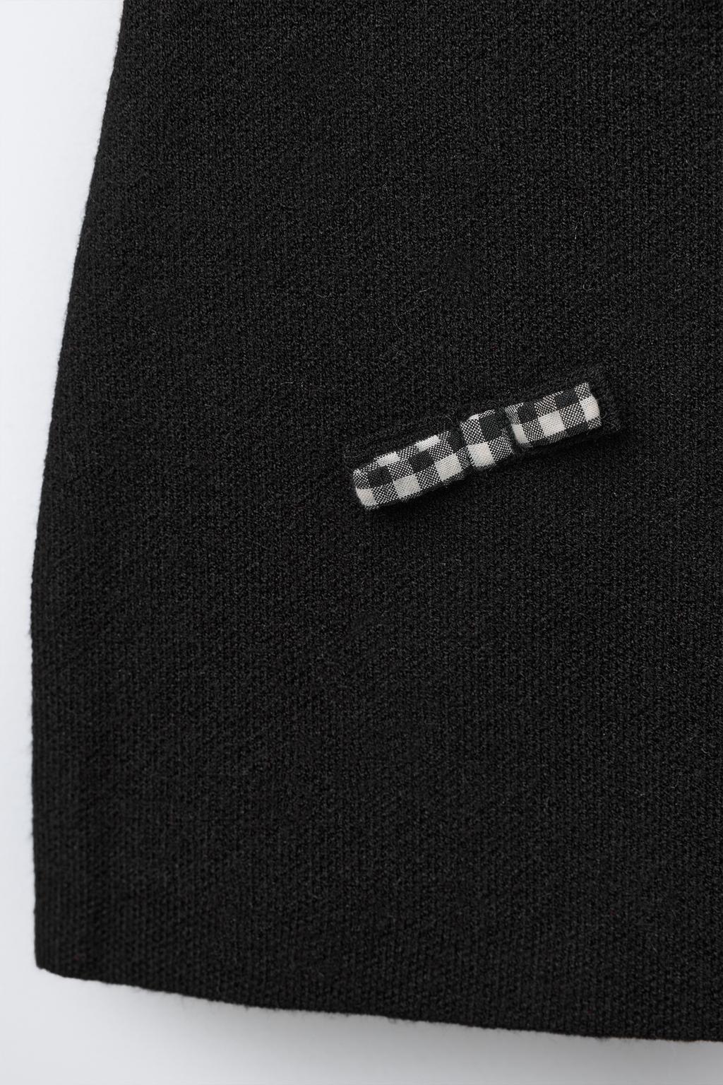 ТРИКОТАЖНОЕ ПЛАТЬЕ С БАНТАМИ В КЛЕТКУ ВИШИ