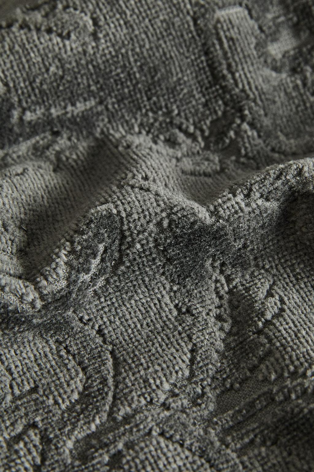 Хлопковое велюровое полотенце с жаккардовым узором и кисточками