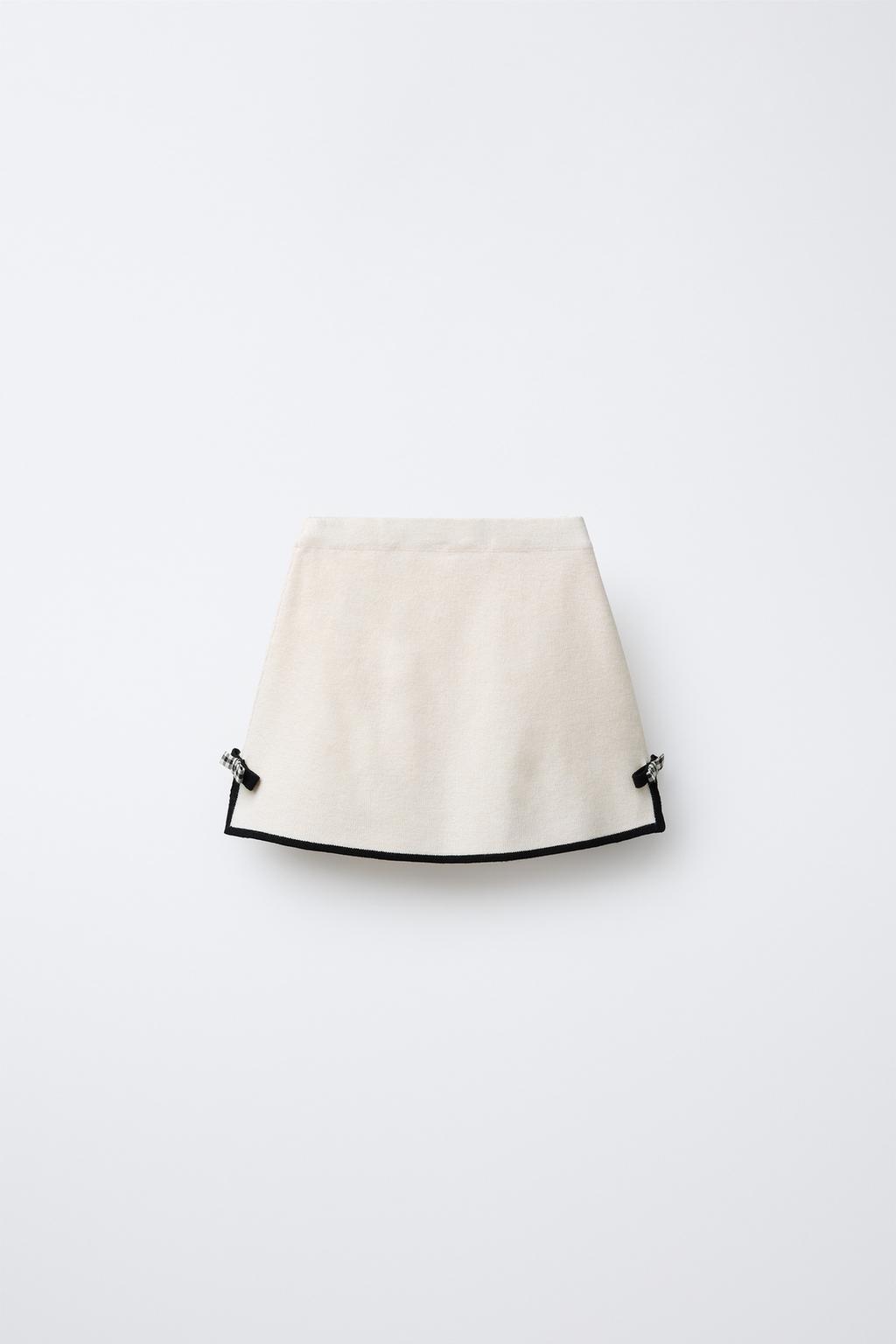 ТРИКОТАЖНАЯ ЮБКА С КОНТРАСТНЫМИ БАНТАМИ