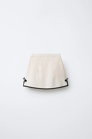 Трикотажная юбка с контрастными бантами- Заказать в России