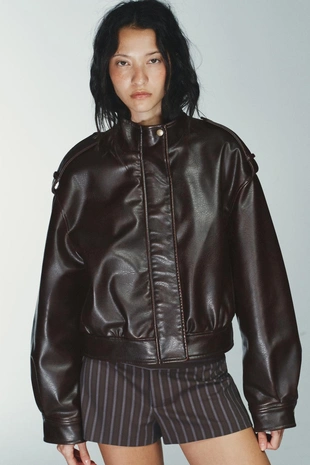 Куртка из искусственной кожи с хлястиками- Заказать в России