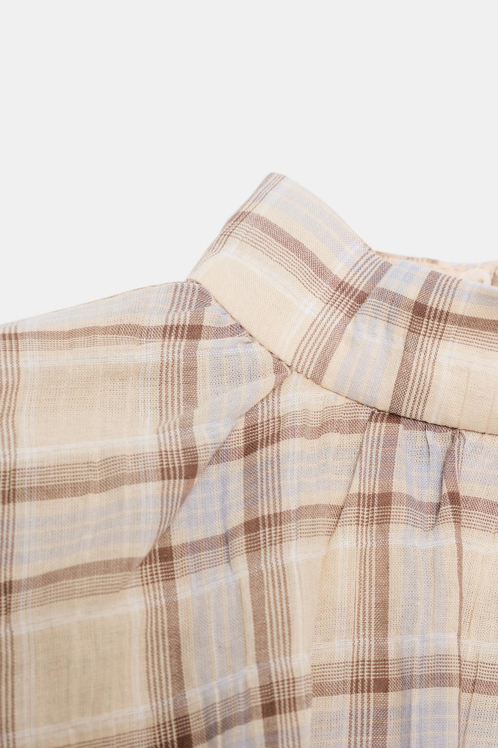 ТОП-НАКИДКА УКОРОЧЕННАЯ В КЛЕТКУ