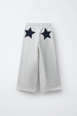 Брюки WIDE LEG из мягкой ткани со звездами- Заказать в России