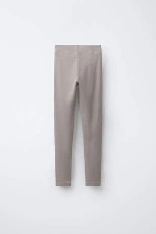 Легинсы в рубчик из модала с этикеткой