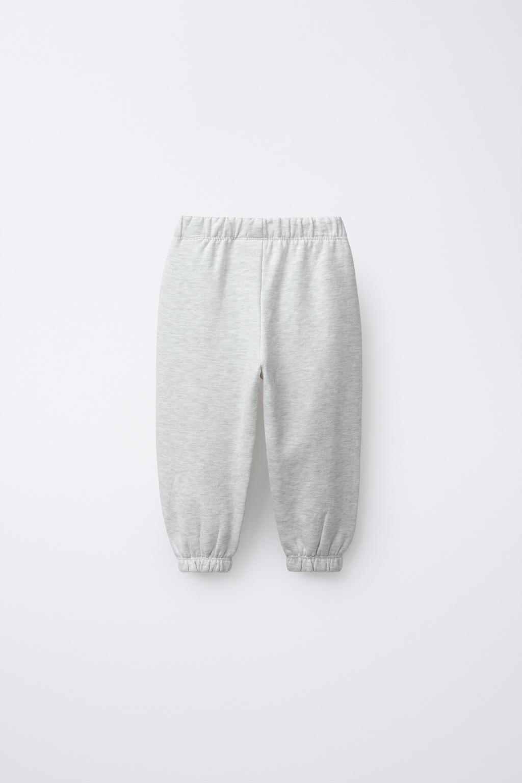 ДЖОГГЕРЫ ИЗ МЯГКОЙ ТКАНИ С ЭТИКЕТКОЙ