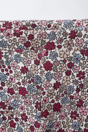 Леггинсы в рубчик с принтом