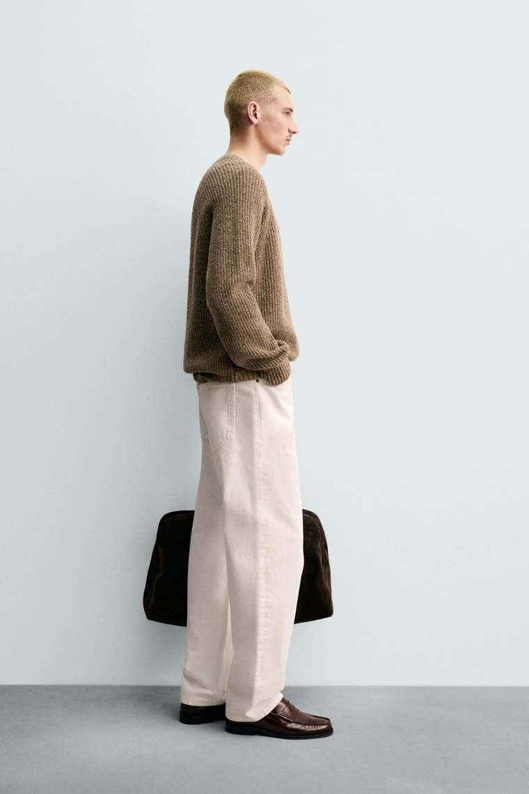 Кардиган с пуговицами из вязаного меланжа происхождение