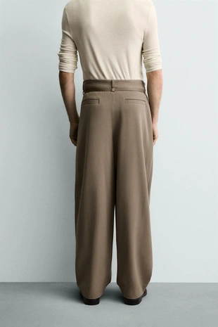 Брюки BALLOON FIT с защипами и поясом- Заказать в России