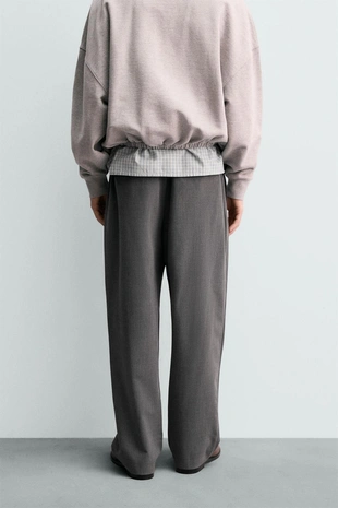 Брюки WIDE FIT со складками- Заказать в России