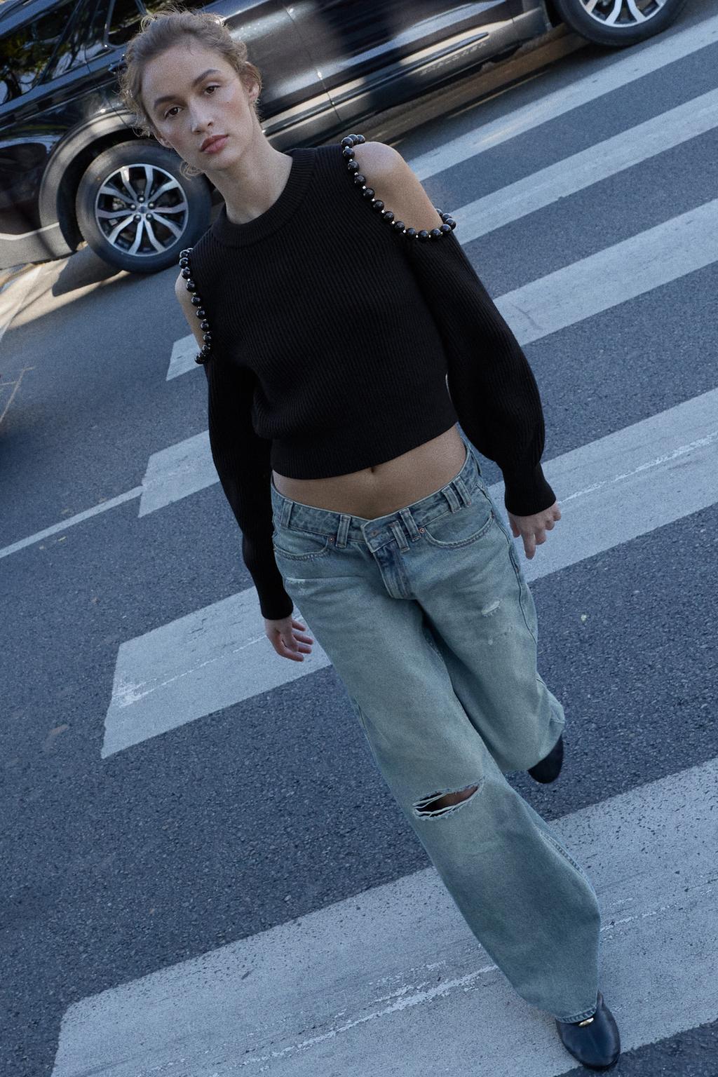 ДЖЕМПЕР В РУБЧИК С ВЫРЕЗАМИ И ШАРИКАМИ