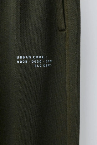 Брюки-джоггеры из мягкой ткани GARMENT DYE- Заказать в России