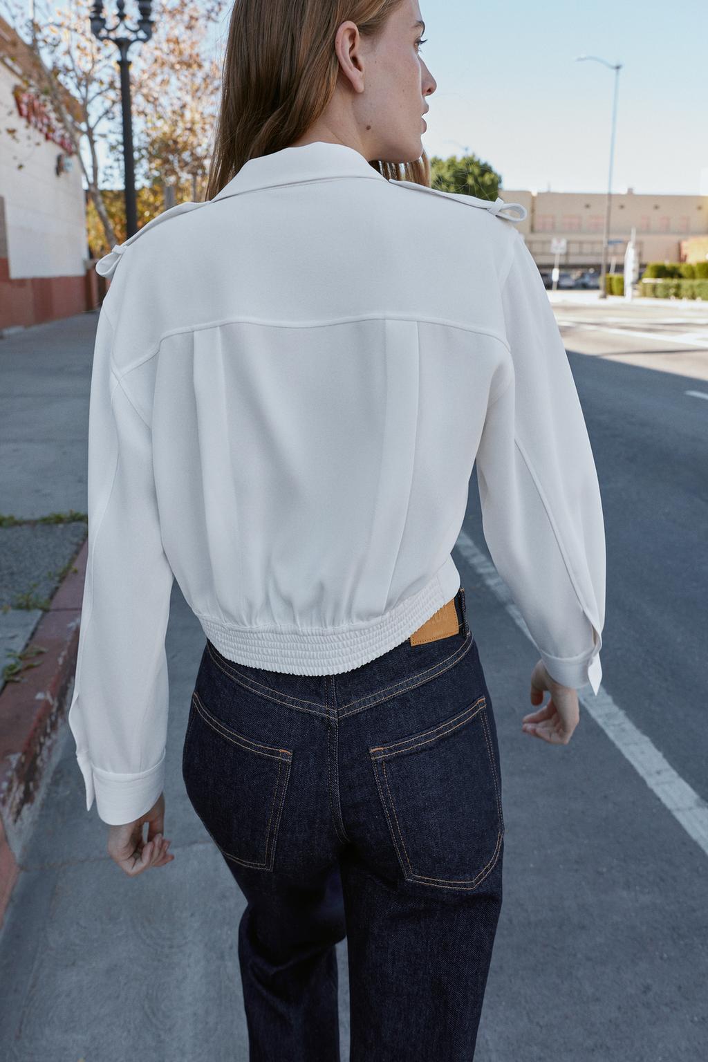 РУБАШКА С ХЛЯСТИКАМИ НА ПЛЕЧАХ