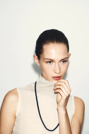 Футболка из шерсти без рукавов- Заказать в России