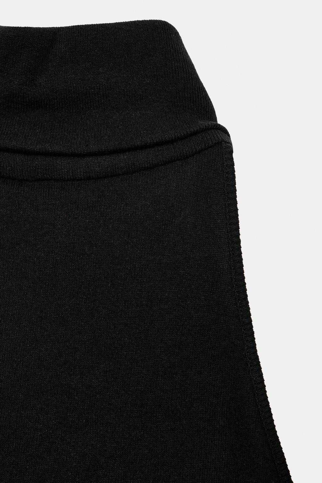 ТОП С ВЫСОКИМ ВОРОТНИКОМ БЕЗ РУКАВОВ