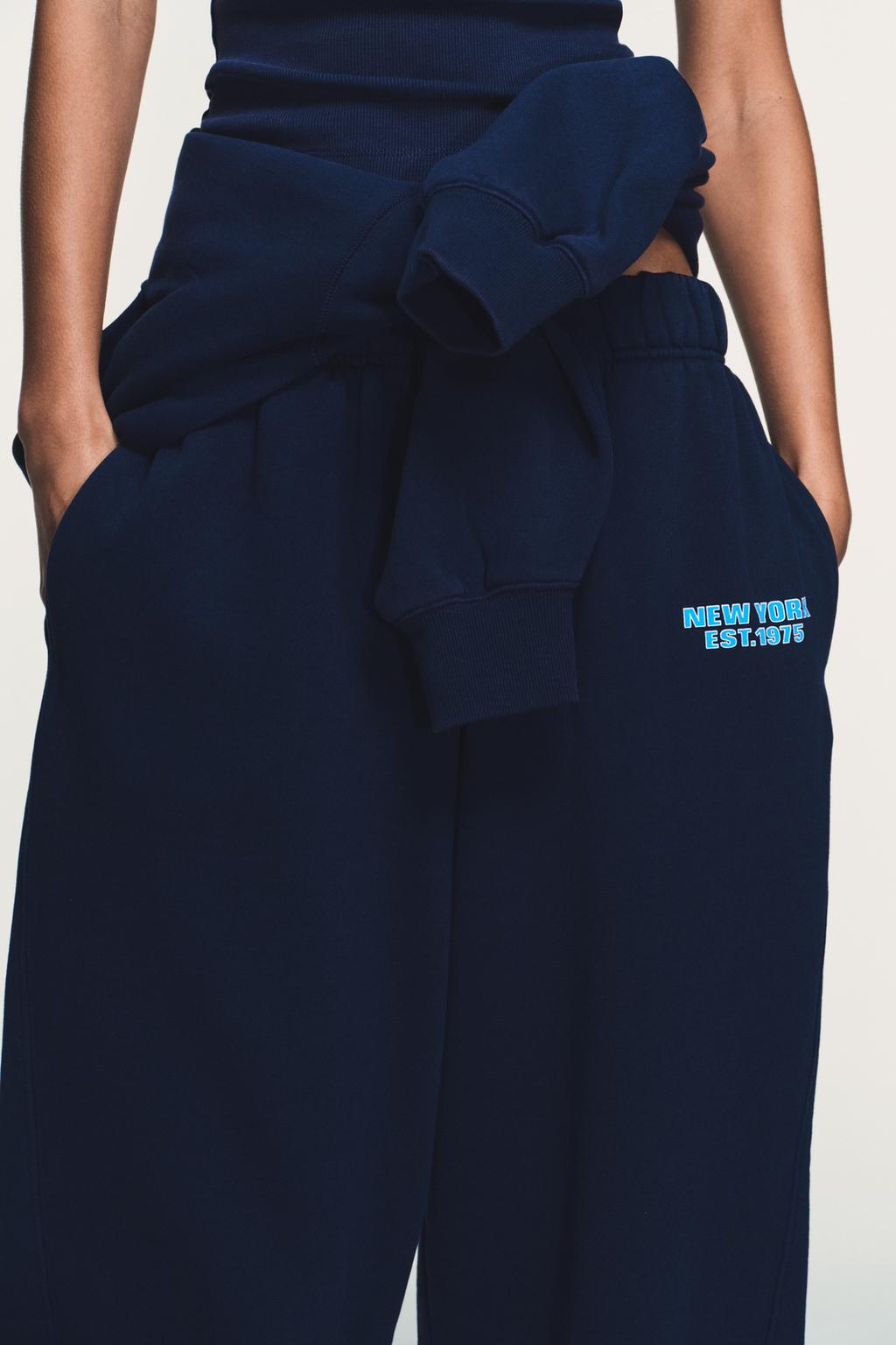 БРЮКИ-ДЖОГГЕРЫ С НАДПИСЬЮ