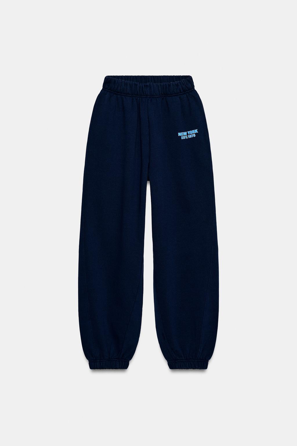 БРЮКИ-ДЖОГГЕРЫ С НАДПИСЬЮ