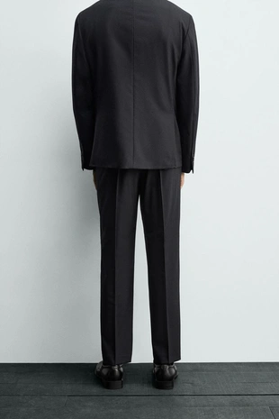 Костюмные брюки из 100% шерсти- Заказать в России